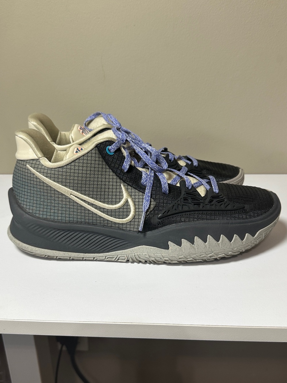 Nike Kyrie Low 4 basketball shoes in Black and Rattan colorway, men’s size 11.5